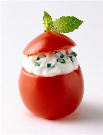 simsearch:652-06818814,k - Tomato stuffed with fromage frais and herbs Foto de stock - Con derechos protegidos, Código: 825-05985056