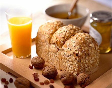 wholewheat bread, walnuts, raisins, cereal and orange juice Stock Photo - Rights-Managed, Code: 825-05985651