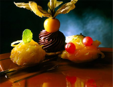 Three tartlet chocolate and fruit dessert by Pierre Hermé Stock Photo - Rights-Managed, Code: 825-05985842