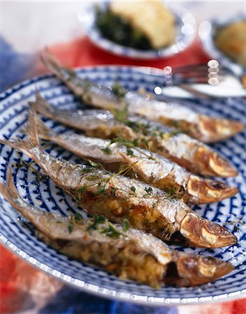 row fish - sardines stuffed with pine seeds Stock Photo - Rights-Managed, Code: 825-05986114