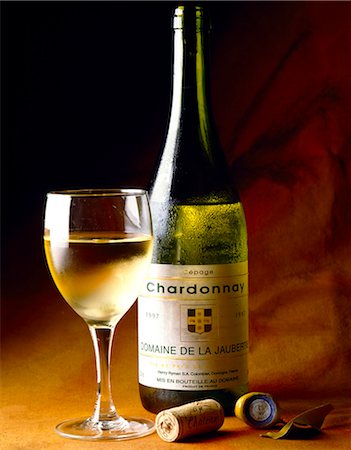 simsearch:652-05806714,k - Glass and bottle of Chardonnay Stock Photo - Rights-Managed, Code: 825-05986317