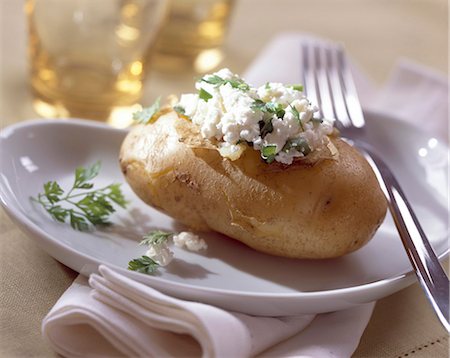 Potato stuffed with fromage frais and herbs Stock Photo - Rights-Managed, Code: 825-05987388