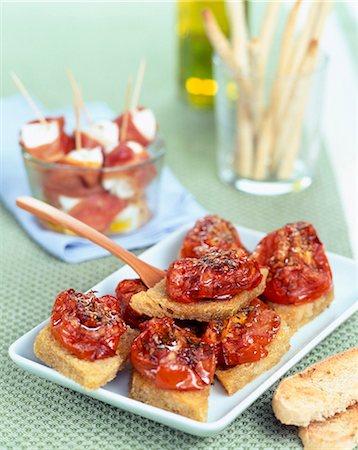 europe appetizer - Preserved tomato Bruschetta Stock Photo - Rights-Managed, Code: 825-05987676