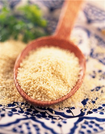 Spoonful of semolina for couscous Stock Photo - Rights-Managed, Code: 825-05988716