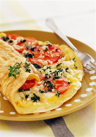 Tomato and fresh herb omelette Stock Photo - Rights-Managed, Code: 825-05990728