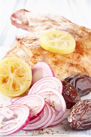 Leg of lamb with red onions,dates and confit lemons Stock Photo - Rights-Managed, Code: 825-06045705