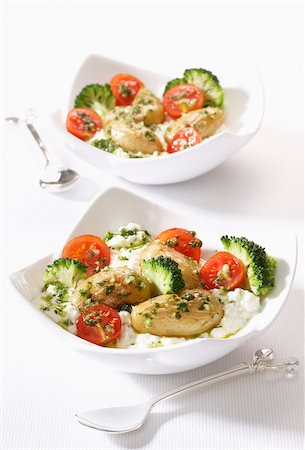 simsearch:825-05814729,k - Hot-cold Touquet Ratte potatoes with broccoli and cherry tomatoes Stock Photo - Rights-Managed, Code: 825-06045754