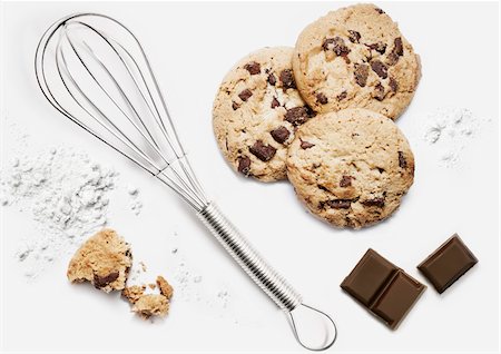 Chocolate chip cookies and whisk Stock Photo - Rights-Managed, Code: 825-06046226