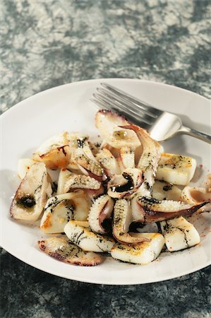 siba (tipo de molusco) - Squid and squid's ink salad Foto de stock - Direito Controlado, Número: 825-06046313