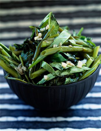 Sauteed Chinese waterspinach with garlic Stock Photo - Rights-Managed, Code: 825-06046671