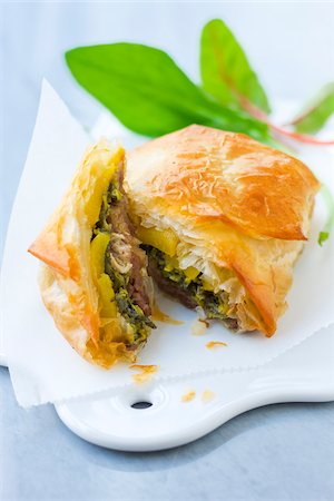 simsearch:652-03800804,k - Potted duck,sorrel and mango filo pastry pie Stock Photo - Rights-Managed, Code: 825-06047210