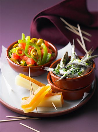 simsearch:652-03803825,k - Tomato and green pepper salad ,marinated anchovies, and cheese with fruit paste Foto de stock - Con derechos protegidos, Código: 825-06047267