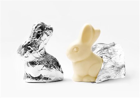 White chocolate rabbits wrapped in aluminium foil Stock Photo - Rights-Managed, Code: 825-06047616