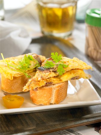 simsearch:825-06047693,k - Anchovy omelette open sandwich Stock Photo - Rights-Managed, Code: 825-06047700