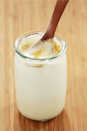 Plain yoghurt in a glass pot with brown sugar Stock Photo - Rights-Managed, Code: 825-06047938