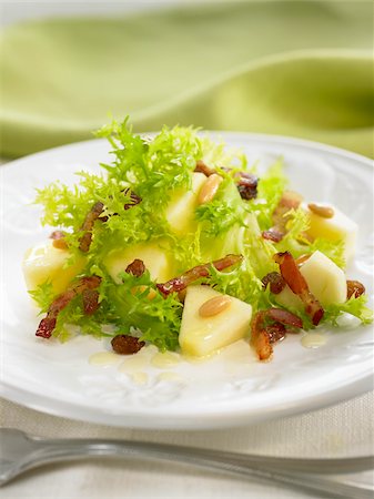 endives cook - Curly endive ,apple and raisin salad Stock Photo - Rights-Managed, Code: 825-06048281