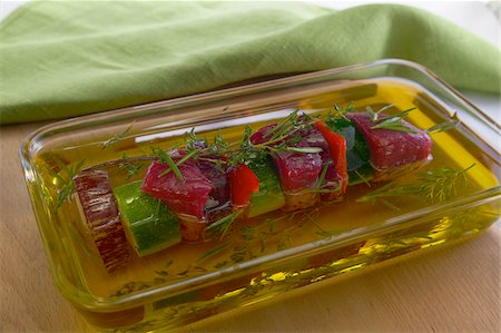 Veal,zucchini ,eggplant and red pepper brochette marinating in olive oil Stock Photo - Rights-Managed, Code: 825-06048366