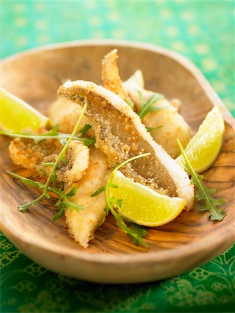 sole fish - Sole fillets coated in breadcrumbs,lemons Stock Photo - Rights-Managed, Code: 825-06048417