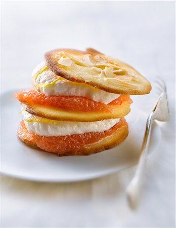 Almond tuile biscuit,pink grapefruit and lemon sorbet Mille-feuille Stock Photo - Rights-Managed, Code: 825-06048460