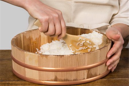 Cook preparing Japanese sticky rice Stock Photo - Rights-Managed, Code: 825-06048723