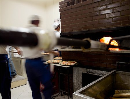 pizza restaurant - Cooking at The Da Michele Pizzeria Stock Photo - Rights-Managed, Code: 825-06049063