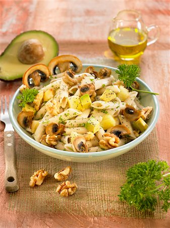 Pasta with mushrooms,avocado,walnuts and poppy seeds Stock Photo - Rights-Managed, Code: 825-06049490