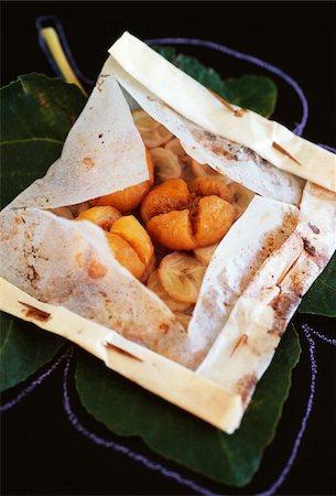 Fig,banana and rum cooked in greaseproof paper Stock Photo - Rights-Managed, Code: 825-06315049