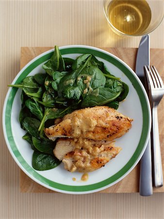 simsearch:825-05987287,k - Grilled chicken breast with spinach ,mustard and onion sauce Stock Photo - Rights-Managed, Code: 825-06315141