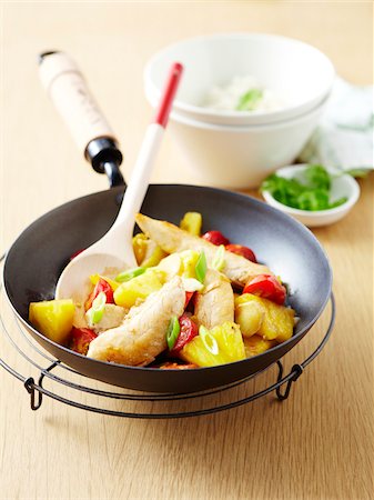 simsearch:825-07522758,k - Chicken,cherry tomatoes and pineapple cooked in a wok Stock Photo - Rights-Managed, Code: 825-06315665