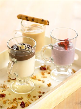 pictures of coffee beans and berry - Coffee-flavored soya cream dessert,vanilla and chocolate cream dessert and blackberry cream dessert Stock Photo - Rights-Managed, Code: 825-06315770