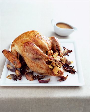 roast (cut of meat) - Chicken stuffed with mushrooms and shallots Stock Photo - Rights-Managed, Code: 825-06315858