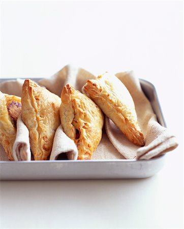puff pastry - Individual goat cheese and tomato pies Stock Photo - Rights-Managed, Code: 825-06315879