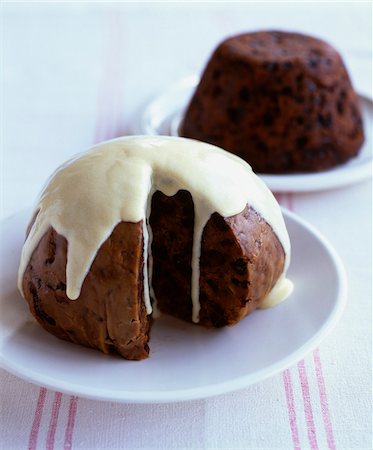 Christmas pudding with custard Stock Photo - Rights-Managed, Code: 825-06315891