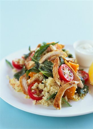 Salade de poulet, semoule, punmpkin et tomate Photographie de stock - Rights-Managed, Code: 825-06315937