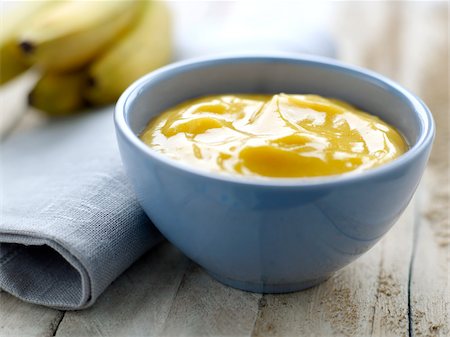 dessert bowl - Bananes et compote de mangue Photographie de stock - Rights-Managed, Code: 825-06316026