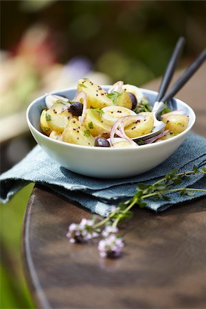 potato salad yellow - Grenaille potato salad with quail's eggs and black olives Stock Photo - Rights-Managed, Code: 825-06316127