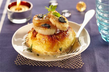 Parmesan Flan topped with pan-fried sliced scallops and truffles Stock Photo - Rights-Managed, Code: 825-06316404