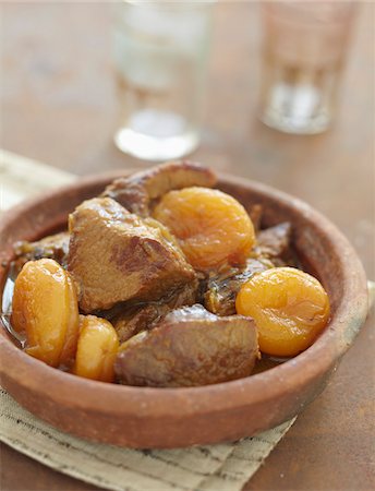 Lamb,dried apricot and almond Tajine Foto de stock - Con derechos protegidos, Código: 825-06316499