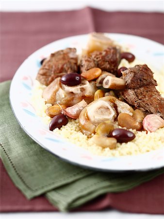 simsearch:652-05809502,k - Lamb Couscous with two types of beans Foto de stock - Con derechos protegidos, Código: 825-06316628