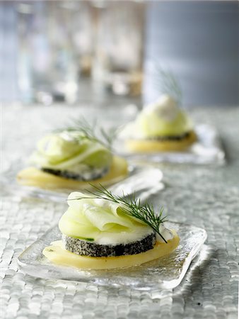 simsearch:652-05806682,k - Potato,goat's cheese and cucumber appetizers Foto de stock - Con derechos protegidos, Código: 825-06316661