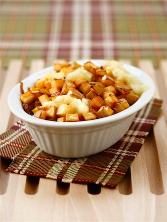 simsearch:825-02304591,k - Duck Parmentier with apples and potatoes Stock Photo - Rights-Managed, Code: 825-06316663