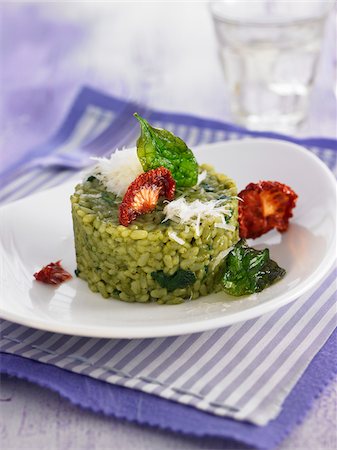 simsearch:825-06316411,k - Spinach risotto with sun-dried tomatoes and manchego Stock Photo - Rights-Managed, Code: 825-06316806