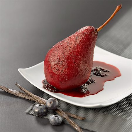 Pear poached with blueberries and vanilla Stock Photo - Rights-Managed, Code: 825-06316874