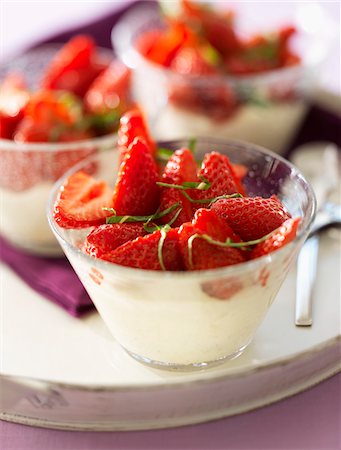 simsearch:825-03629243,k - Whipped cream with strawberries and mint Stock Photo - Rights-Managed, Code: 825-06316914