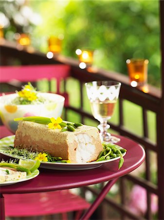 fish terrine - Monkfish terrine on a table on the terrace Foto de stock - Con derechos protegidos, Código: 825-06316926