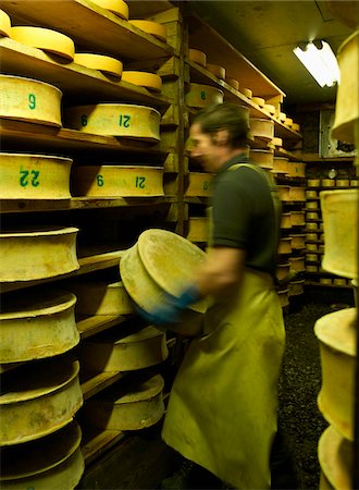 france cellar - Michel Chardon turning over whole Beaufort cheeses Stock Photo - Rights-Managed, Code: 825-06316984