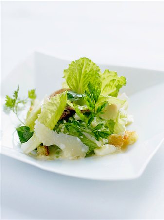 Mixed lettuce salad with hot Ventrèche and parmesan flakes Photographie de stock - Rights-Managed, Code: 825-06815586