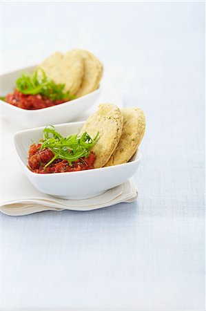 flaked oat - Crunchy oat galettes with tomato salsa Stock Photo - Rights-Managed, Code: 825-06815658
