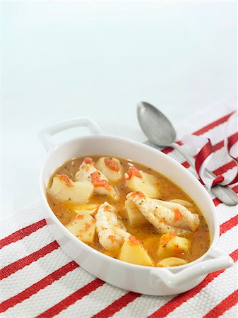 fish stew - Cod and potato stew in white wine and tomato sauce Stock Photo - Rights-Managed, Code: 825-06815814