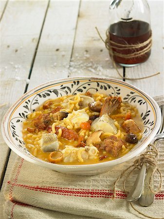 fish stew - Fideos pasta with boletus mushrooms,pork,rabbit and salt-cod Stock Photo - Rights-Managed, Code: 825-06815835
